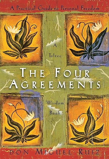 Reading in a book :The Four Agreements: A Practical Guide to Personal Freedom.